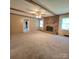 Spacious living room with fireplace and natural light at 6573 Weldon Nw Cir # 22, Concord, NC 28027