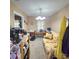 Cozy carpeted home office space with a comfortable sofa and natural light from the window at 6573 Weldon Nw Cir # 22, Concord, NC 28027