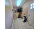 Large storage room has tile flooring and cabinet storage at 6573 Weldon Nw Cir # 22, Concord, NC 28027