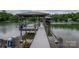Beautiful dock with boat lift and canopy offers a perfect spot for relaxation and lakeside enjoyment at 7455 Ivey Dr, Sherrills Ford, NC 28673