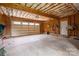 Spacious garage with insulated ceiling, paneled door, and ample room for storage or a workshop at 7455 Ivey Dr, Sherrills Ford, NC 28673
