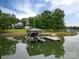 Stunning waterfront property with boat dock and lush green landscaping at 7455 Ivey Dr, Sherrills Ford, NC 28673