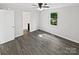 Bright and airy bedroom featuring wood flooring and natural light at 905 Brookdale St, Kannapolis, NC 28083