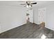 Comfortable bedroom featuring wood flooring and neutral colors at 905 Brookdale St, Kannapolis, NC 28083