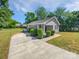 Charming single-story home with a manicured lawn and a concrete driveway at 905 Brookdale St, Kannapolis, NC 28083