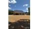 Newly built home with a seeded yard and a view of the back of the house at 908 Westminster Dr, Statesville, NC 28677