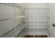Walk-in pantry with ample wire shelving for organized storage at 908 Westminster Dr, Statesville, NC 28677