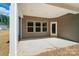 Covered patio providing ample space with an inviting atmosphere at 908 Westminster Dr, Statesville, NC 28677