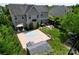 Expansive backyard includes a sport court, patio, outdoor seating, a garden and mature trees at 9612 Indian Beech Nw Ave # 1266, Concord, NC 28027