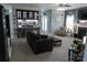 Open concept living room flows to the kitchen and features a cozy fireplace, and comfortable seating at 9612 Indian Beech Nw Ave # 1266, Concord, NC 28027