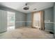 Spacious bedroom with neutral paint, carpet flooring, and natural light at 9927 Raddington Ln, Charlotte, NC 28269