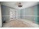 Relaxing bedroom with french doors, carpet flooring, and ample space at 9927 Raddington Ln, Charlotte, NC 28269