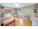 Bright, spacious ' bedroom with hardwood floors, bunk beds, desk and chair, and fun decorations at 1014 Vandalia Dr, Charlotte, NC 28212