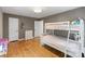 Cozy ' bedroom with hardwood floors, bunk beds, neutral walls, and a charming, playful ambiance at 1014 Vandalia Dr, Charlotte, NC 28212