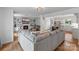 Bright living room featuring a fireplace, built-in shelving, and an open layout at 1014 Vandalia Dr, Charlotte, NC 28212