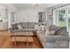 Cozy living room with neutral walls, hardwood floors, and comfortable seating at 1014 Vandalia Dr, Charlotte, NC 28212