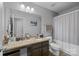 Bathroom with granite countertop vanity and framed mirror at 10418 Cullen Ct, Charlotte, NC 28278