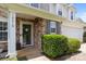 Inviting front porch with stone accents and stylish front door at 10418 Cullen Ct, Charlotte, NC 28278