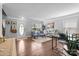 Inviting living room with hardwood floors, neutral paint, and cozy seating area at 10418 Cullen Ct, Charlotte, NC 28278