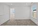 Carpeted bedroom with natural light and an ensuite bathroom at 14028 Parkside Crossing Dr # 331, Charlotte, NC 28273