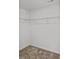 Walk-in closet with installed wire shelving and neutral carpeting at 14028 Parkside Crossing Dr # 331, Charlotte, NC 28273