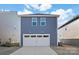 Exterior photo of a two car garage and extended driveway at 14028 Parkside Crossing Dr # 331, Charlotte, NC 28273