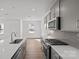Bright kitchen with stainless steel appliances, a large island, and an open floor plan at 14028 Parkside Crossing Dr # 331, Charlotte, NC 28273