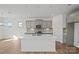 A large kitchen with an island, stainless appliances, and an open concept at 14028 Parkside Crossing Dr # 331, Charlotte, NC 28273