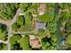 Aerial shot of a property with mature landscaping, a long driveway, and waterfront access at 141 Ridge Top Rd, Mooresville, NC 28117