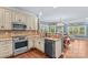 Well-appointed kitchen with granite countertops, stainless steel appliances, and ample cabinet space at 141 Ridge Top Rd, Mooresville, NC 28117