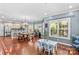 Open living area with dining, kitchen, and activity space is light and bright with many windows at 141 Ridge Top Rd, Mooresville, NC 28117