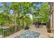 Stunning patio with outdoor dining and lake views, perfect for entertaining or relaxing at 141 Ridge Top Rd, Mooresville, NC 28117