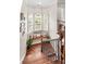Stairway landing with built in seating area surrounded by windows that provide lots of natural light at 141 Ridge Top Rd, Mooresville, NC 28117