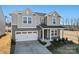 Charming two-story home with attached two-car garage and landscaped yard at 14113 New Crest Ln # 162, Huntersville, NC 28078