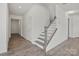 Hallway featuring vinyl floors and a staircase at 14113 New Crest Ln # 162, Huntersville, NC 28078