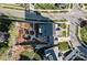 A beautiful aerial view shows the home's meticulously designed garden and landscaping at 1502 Matthew Mcclure Cir, Davidson, NC 28036