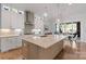 Spacious kitchen with large island, modern appliances, and pendant lighting at 1502 Matthew Mcclure Cir, Davidson, NC 28036