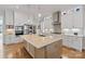Kitchen with large island, stainless steel appliances and custom cabinetry at 1502 Matthew Mcclure Cir, Davidson, NC 28036