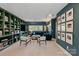 Spacious living room with built-in bookshelves, comfortable seating, and a cozy atmosphere, great for relaxation at 1502 Matthew Mcclure Cir, Davidson, NC 28036
