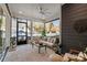Inviting sunroom with comfortable furniture and scenic views at 1502 Matthew Mcclure Cir, Davidson, NC 28036