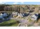 Attractive homes and manicured lawns create a charming neighborhood streetscape at 1502 Matthew Mcclure Cir, Davidson, NC 28036