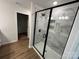 Modern bathroom featuring a black-framed glass shower with marble tile and niche at 1563 Riverview Cir, Fort Lawn, SC 29714