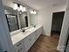 Bathroom features double vanity with quartz countertop and modern fixtures at 1563 Riverview Cir, Fort Lawn, SC 29714