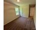 Bright bedroom with large window and neutral carpet at 1563 Riverview Cir, Fort Lawn, SC 29714