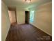 Cozy bedroom features a neutral color scheme, carpeted floors, a closet, and bright natural light at 1563 Riverview Cir, Fort Lawn, SC 29714