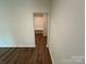 Hall tree mudroom area with bench and hooks, and luxury vinyl plank flooring at 1563 Riverview Cir, Fort Lawn, SC 29714