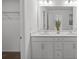 Modern bathroom with double vanity, quartz countertop, and ample storage space at 15926 Parkside Crossing Dr # 322, Charlotte, NC 28273