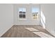 Bright and airy bedroom with large windows offering neighborhood views at 15926 Parkside Crossing Dr # 322, Charlotte, NC 28273