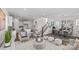 Comfortable living space featuring an open-concept design with seamless flow between the kitchen and living area at 15926 Parkside Crossing Dr # 322, Charlotte, NC 28273