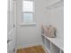 Mudroom with window, bench, and storage space at 15926 Parkside Crossing Dr # 322, Charlotte, NC 28273